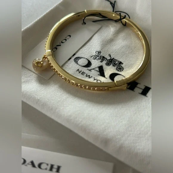 Coach viral pearl charm rhinestone gold hinge bracelet